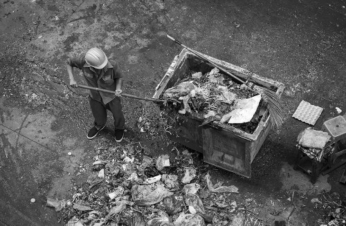 Business professionals managing waste in an office in Earls Court