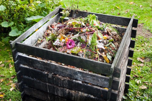 Workers handling commercial rubbish and loading bins safely